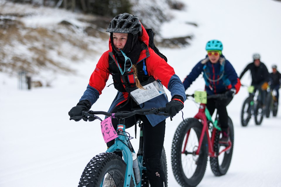 Team Dazed Adventure's Toni Trottier rides up the trail stage 2 fat bike at the third annual Arctic Fox Winter Stage Race, a cross-country ski and fat tire biking orienteering race, on Saturday (March 23) at the Canmore Nordic Centre. JUNGMIN HAM RMO PHOTO