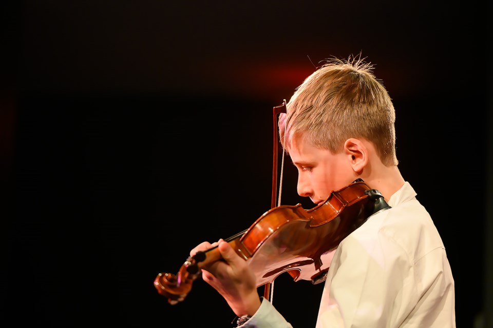 Reid Macintosh plays "Adoration" on his violin for the Bow Valley Music Festival Showcase Concert in Canmore at artsPlace on Sunday (March 24).  MATTHEW THOMPSON RMO PHOTO