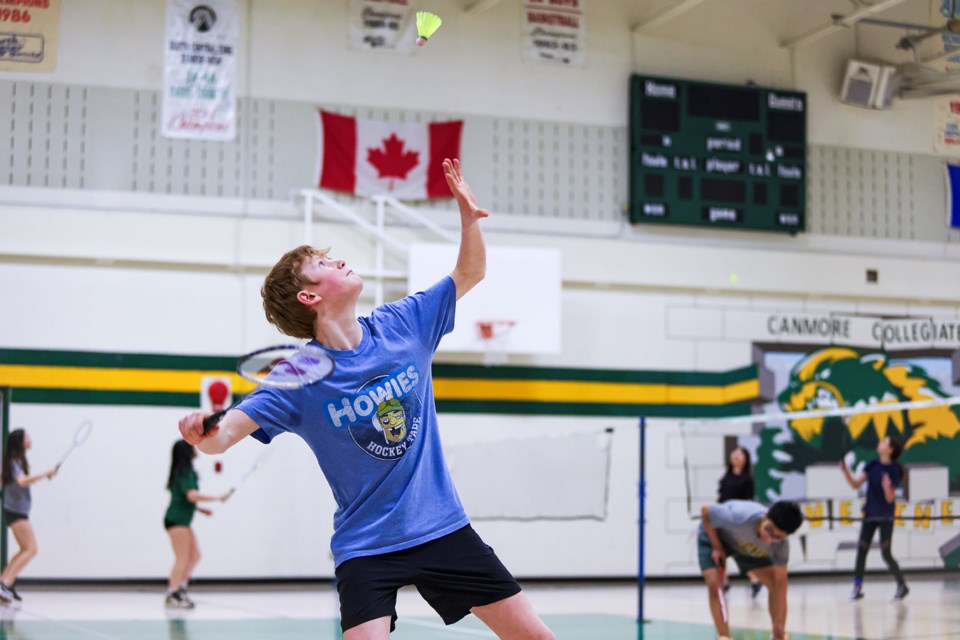 Canmore Collegiate High School Carson Mckendrick gets ready to smash the birdie during the friendly badminton pre-season competition between Banff and Canmore at Canmore Collegiate High School on Thursday (March 27). JUNGMIN HAM RMO PHOTO