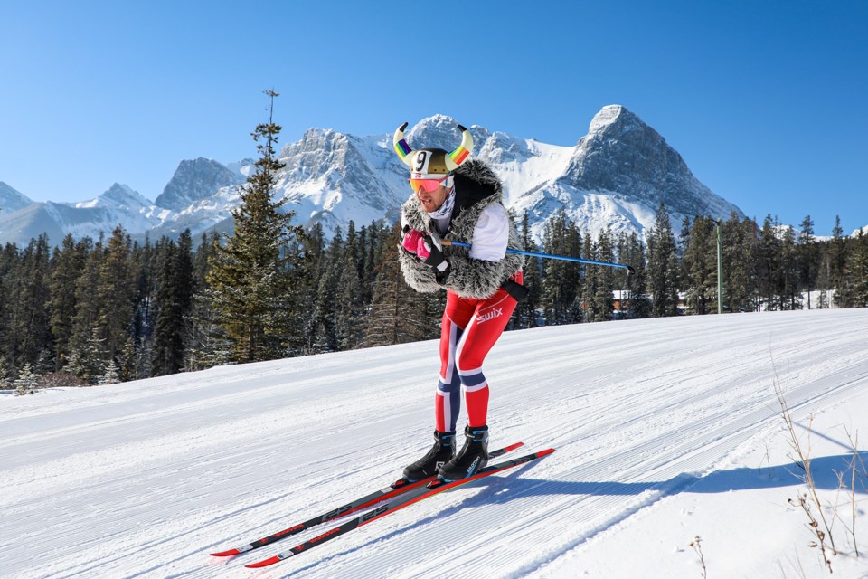 Mikhail Kudienko tucks for speed in the king of the vikings' 10-km continuous pursuit at the Western Cup LGBTQ cross-country ski race on Saturday (March 30) at the Canmore Nordic Centre. JUNGMIN HAM RMO PHOTO 