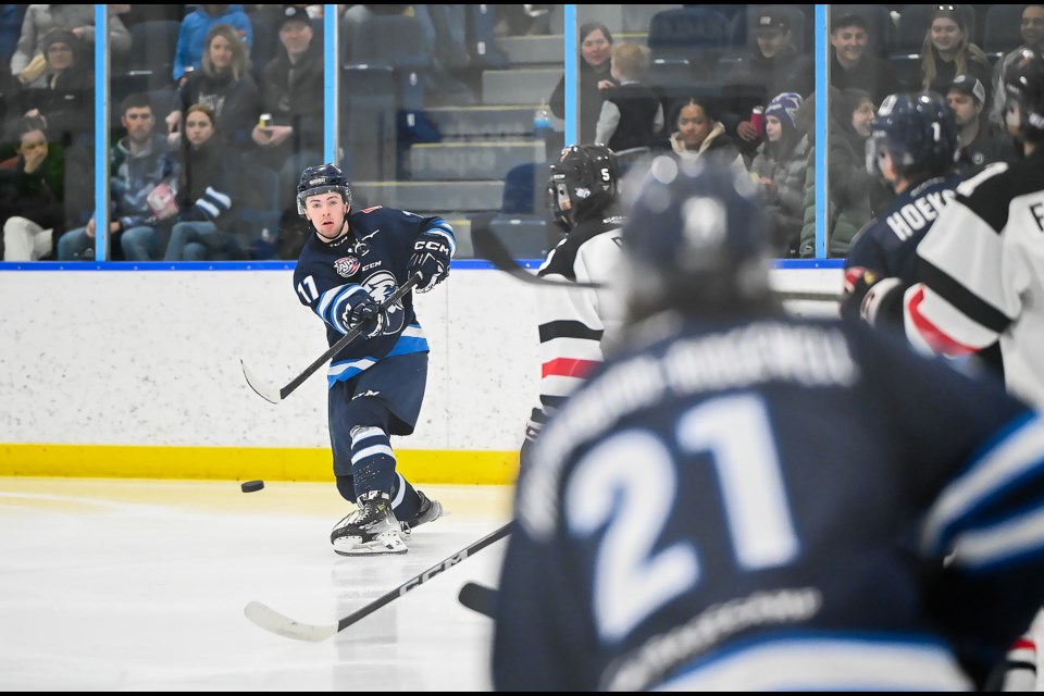 Canmore Eagles center Owen Jones fires a pass across the ice during a game against the Whitecourt Wolverines in Canmore on Tuesday (April 2). The Eagles lost 2-5 against the Wolverines. The series now favours the Wolverines 2-1. MATTHEW THOMPSON RMO PHOTO