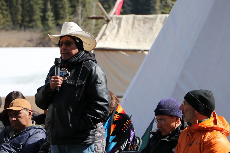 Chiniki First Nation councillor Charles Mark, of the Îyârhe (Stoney) Nakoda First Nation, speaks during a celebration at Cascade Ponds day-use area, marking the launch of the Banff National Park Indigenous Advisory Circle's gantry sign initiative Wednesday (April 10). Going forward, the sign will welcome visitors into the park in Indigenous languages. 

JESSICA LEE RMO PHOTO
