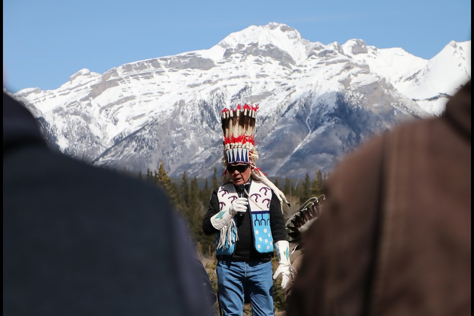 Martin Heavy Head, a Kainai Nation elder of the Blackfoot Confederacy, speaks during a celebration at Cascade Ponds day-use area to mark the launch of the Banff National Park Indigenous Advisory Circle's gantry sign initiative Wednesday (April 10). Going forward, the sign will welcome visitors into the park in Indigenous languages.

JESSICA LEE RMO PHOTO