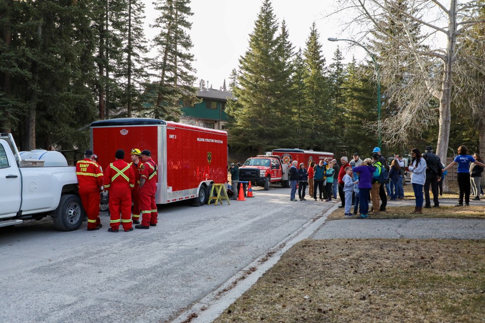 Banff Fire Department partnered with Canmore Fire-Rescue and Parks Canada to demonstrate to residents of Banff’s Valleyview neighbourhood how crews would suppress approaching fire with high-powered sprinkler systems and firetruck operations on Tuesday (April 23). JUNGMIN HAM RMO PHOTO