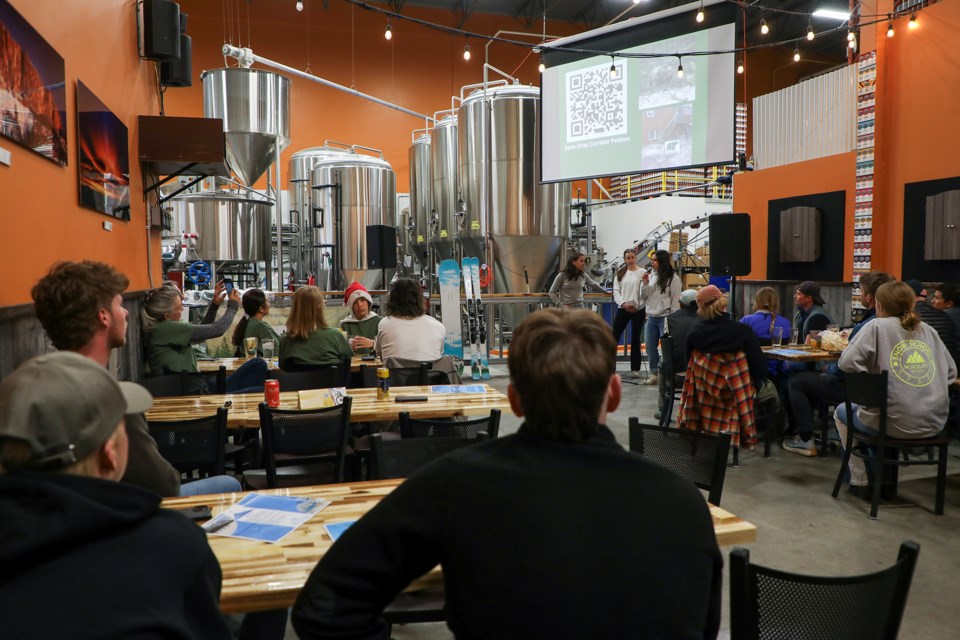 Students of local vocational college Timberline Canadian Alpine Academy share their community-eco project presentations to celebrate Earth Week at Canmore Brewing Company on Thursday (April 25). JUNGMIN HAM RMO PHOTO 