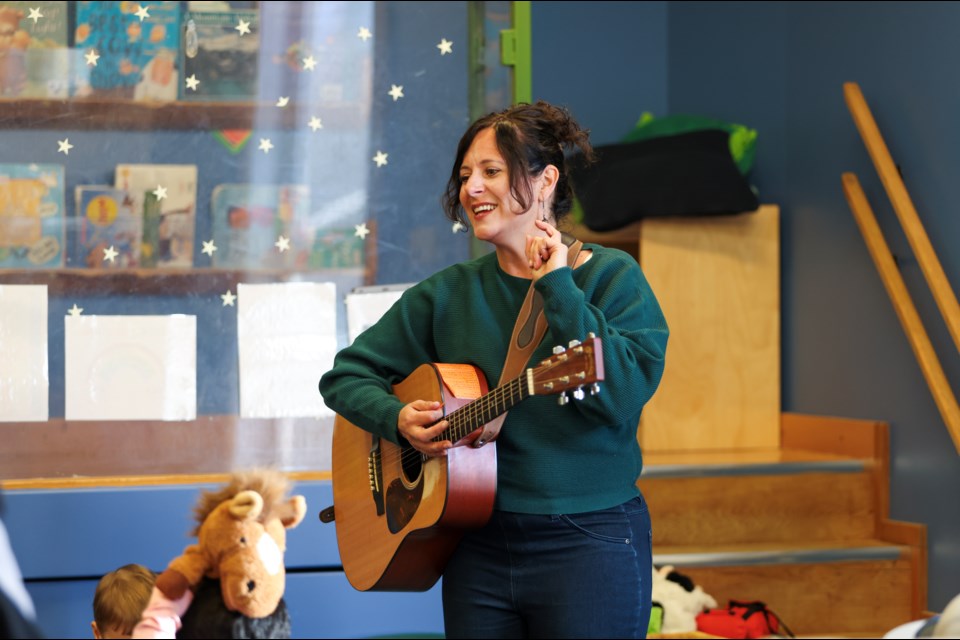 Corina Strim leads music activities at the Spring Early Years Fair at Canmore Community Daycare Society on Saturday (May 4).  JUNGMIN HAM RMO PHOTO