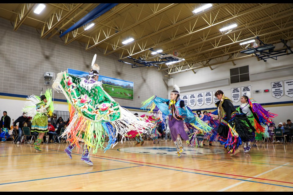 Junior girls do a fancy dance at the Mînî Thnî Community School powwow on Thursday (May 30). JUNGMIN HAM RMO PHOTO 