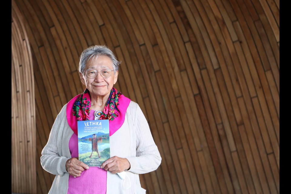 Tina Fox is pictured with her recently released book "Îethka Stories & Language in Stoney Nakoda Country" during its launch event celebrated Friday (June 21) at the Calgary Public Library. The book is co-authored by Fox's late son, Trent Fox.

JESSICA LEE RMO PHOTO