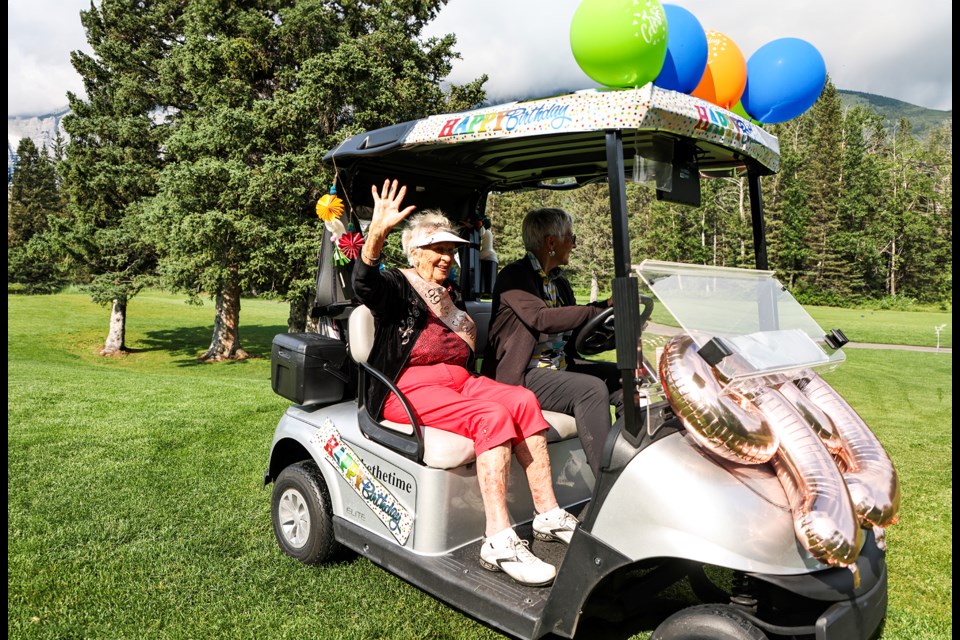 Zenith Hrdlicka waves for the camera during her 99th birthday celebration at the Kananaskis Country Golf Course on Tuesday (Aug. 6). JUNGMIN HAM RMO PHOTO