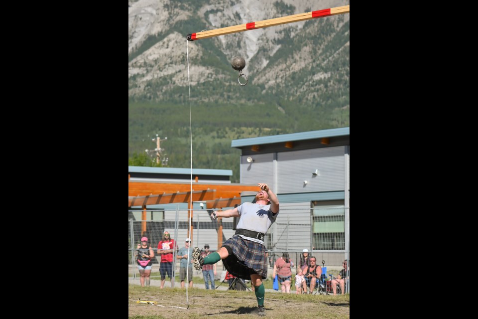 Owen Ferguson attempts to launch 56lb weight over the bar in the Heavy Games competition at the 33rd Canmore Highland Games on Sunday (Sept. 1). MATTHEW THOMPSON RMO PHOTO
