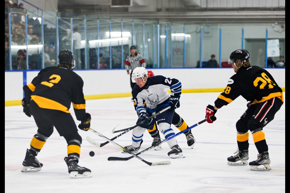 Canmore Eagles forward Tavynn Schlaht looks to break down the defence during a preseason game at the Canmore Recreation Centre on Friday (Sept. 6). The Eagles won 6-3. JUNGMIN HAM RMO PHOTO