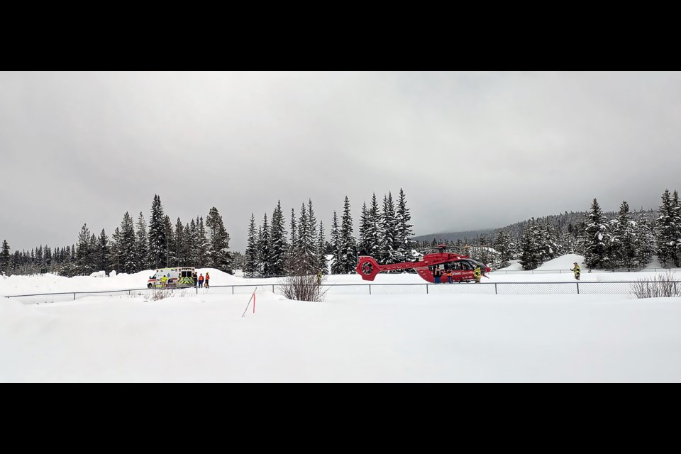 A STARS helicopter and ambulance were on scene to help with an avalanche in the Lake Louise area on Friday (March 14). PHOTO COURTESY OF RCMP