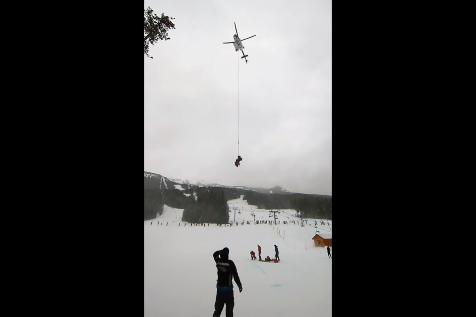 A rescue helicopter was on scene to help with an avalanche in the Lake Louise area on Friday (March 14). PHOTO COURTESY OF RCMP