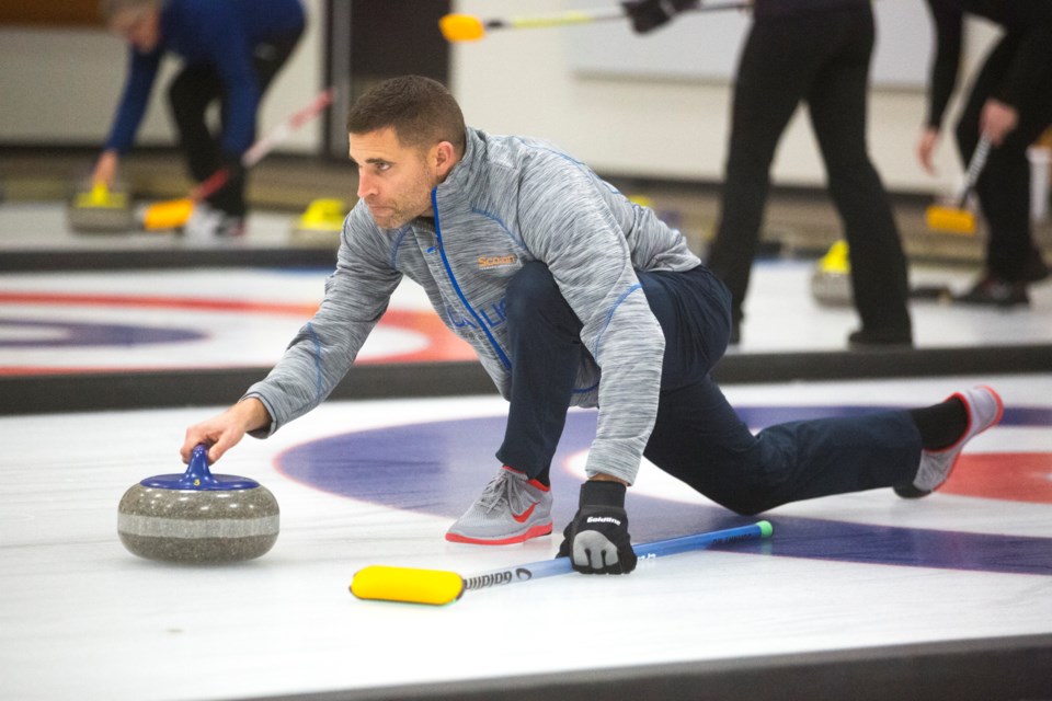 Olympic gold medallist John Morris throws a rock during the inaugural Qualico Mixed Doubles Classic that took place in Banff and Canmore in January. RMO FILE PHOTO
