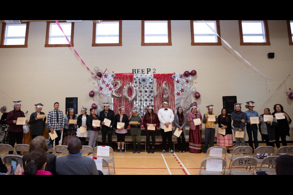 Students from the Bearspaw Empowerment Employment Program receive their diplomas during their graduation ceremony at the Bearspaw Youth Centre in Morley on Thursday (Sept. 26). EVAN BUHLER RMO PHOTO