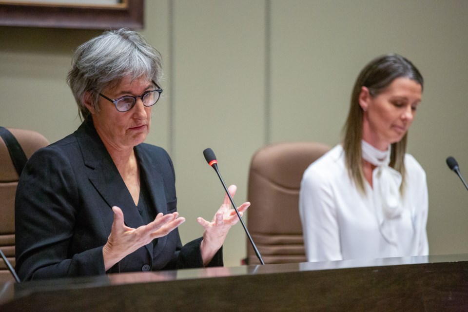 NDP candidate, Anne Wilson, left, answers a question during the 100 Debates on the Environment forum while PPC candidate Nadine Wellwood listens at the Canmore Civic Centre on Thursday (Oct. 3). Evan Buhler RMO PHOTO