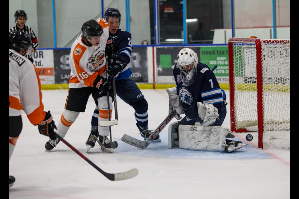 Canmore Eagles goalie Matthew Malin kicks away a puck against the Drumheller Dragons at the Canmore Recreation Centre on Friday (Oct. 7). JUNGMIN HAM RMO PHOTO