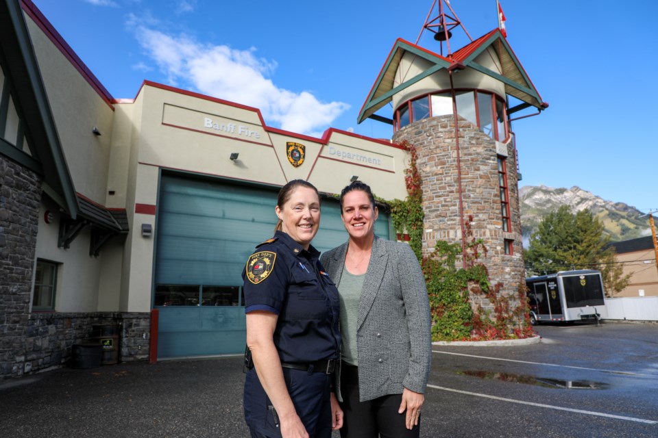 Katherine Severson, Banff’s new director of emergency and protective services, right, and Keri Martens, Banff’s deputy fire chief, pose at the Banff Fire Department on Thursday (Sept.7). JUNGMIN HAM PHOTO