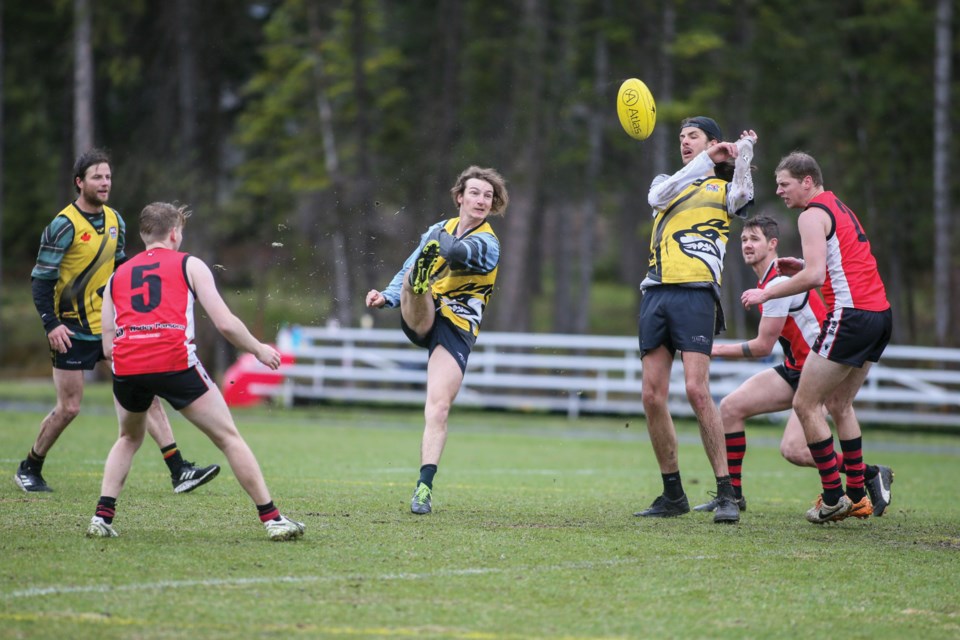 Australian football teams battle it out at the Banff Recreation Grounds in May 2019. RMO FILE PHOTO