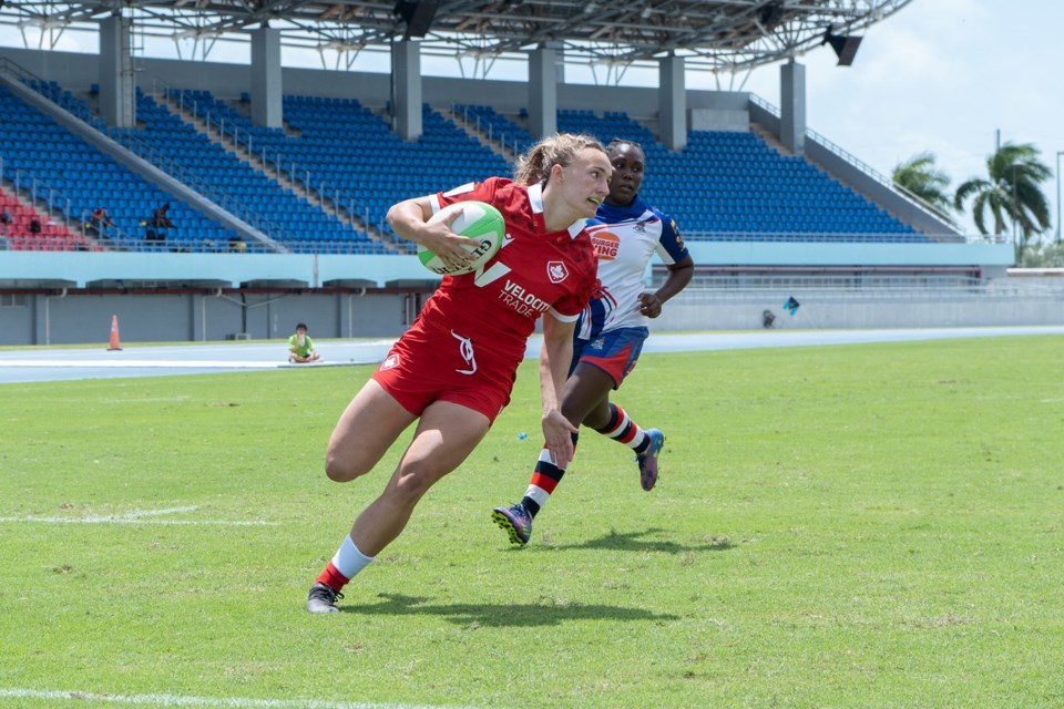 Canada's Krissy Scurfield runs in a try against the Cayman Islands in April 2022 in Nassau, The Bahamas during the Rugby Americas North sevens qualifier for the 2022 Commonwealth Games. RUGBY CANADA PHOTO