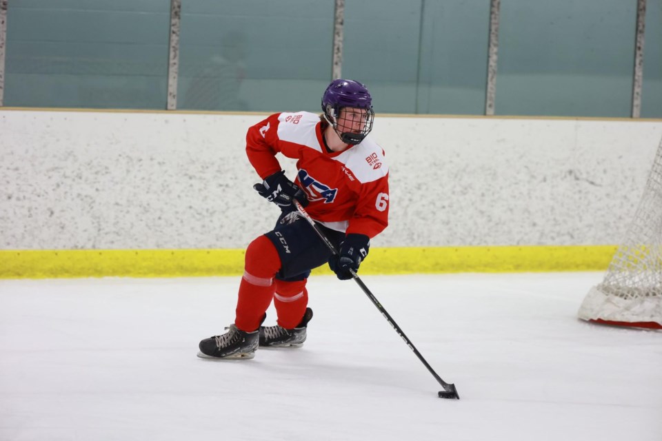 Canmore's Finn McLaughlin, wearing the stars and stripes, handles a puck at the the USA Hockey's Boys Select 16 Player Development Camp in New York state earlier this month. SUBMITTED PHOTO
