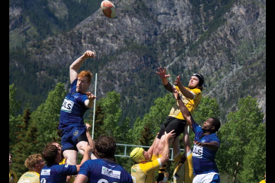 Isaac Fish reaches for the ball during the Banff Bears vs. Calgary Rams game on Saturday (July 27). Photo Credit: Kiah Lucero