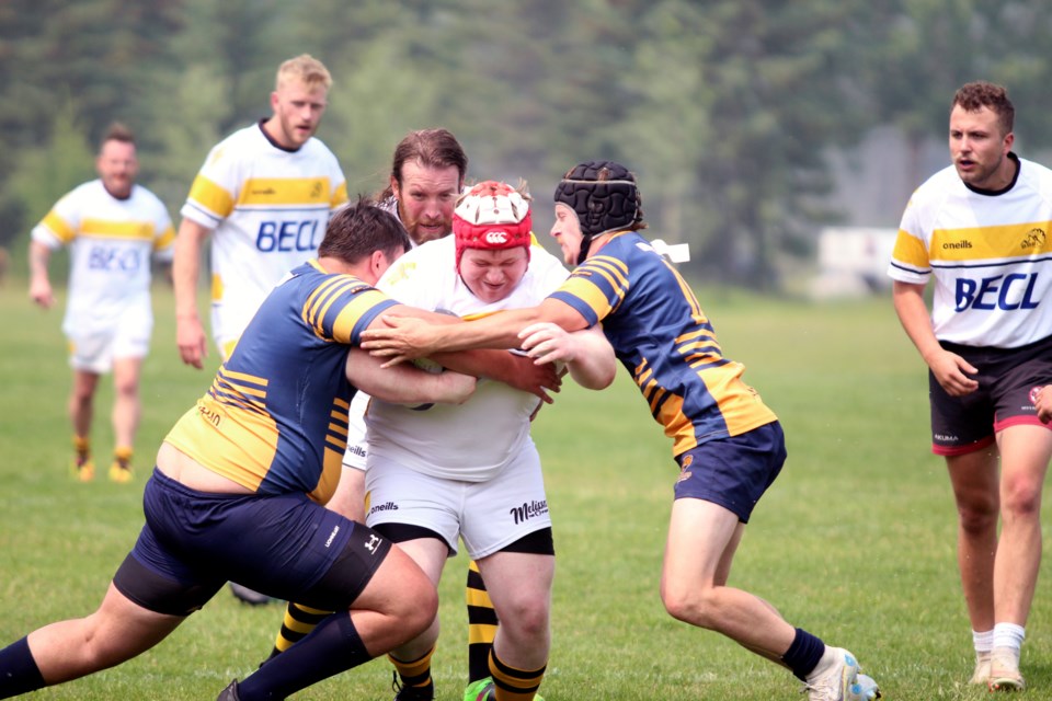 Banff Bears Ossi Treutler powers his way to score a try against the Bow Valley Grizzlies on Saturday (July 15) at Banff Recreation Grounds. Banff lost 33-19. JORDAN SMALL RMO PHOTO