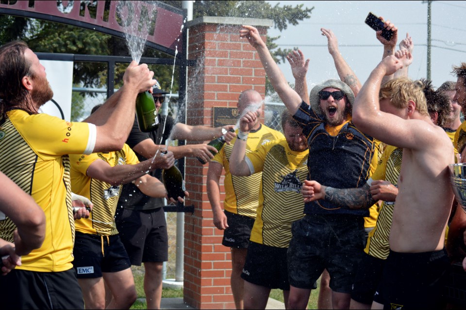 It's a champagne shower for the Banff Bears rugby men after winning the CRU championship 19-15 against the Bow Valley Grizzlies on Saturday (Sept. 10) at Calgary Rugby Union park. JORDAN SMALL RMO PHOTO