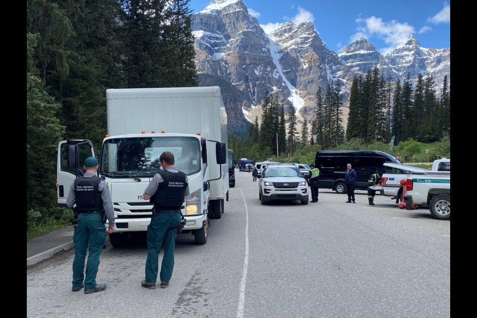 A joint RCMP, Parks Canada, Alberta Sheriffs bus inspection at Moraine Lake. Photo courtesy Lake Louise RCMP