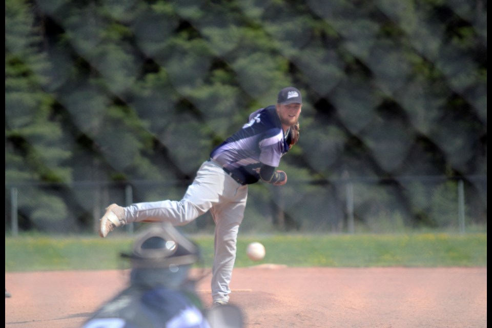 Bow Valley Blues pitcher Torin Young throws some heat against the Davisburg Sodbusters at Millennium Park in Canmore on Sunday (May 28). JORDAN SMALL RMO PHOTO