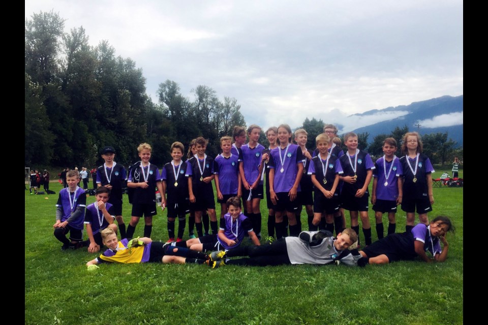 Canmore B team with their gold medals. Submitted Photo
