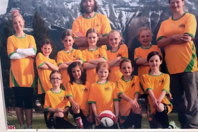 A Bow Valley youth soccer team, with Stella Geestman (bottom centre), Mary Huggill (second from bottom left), Sisi Steel (second from top right) and Marc Geestman (top centre). SUBMITTED PHOTO