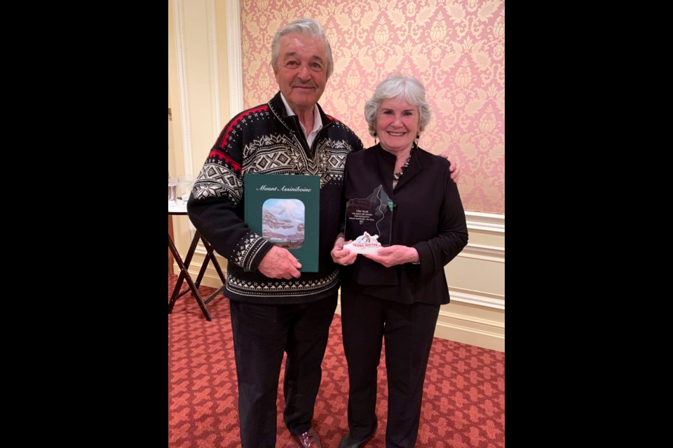 Banff author and historian Chic Scott and wife Kathy Madill-Scott pose for a photo at the International Skiing History Association's annual awards banquet in Sun Valley, Idaho, on March 24. Scott won the John Fry Award for Excellence for his book 'Mount Assiniboine – The Story.' SUBMITTED PHOTO