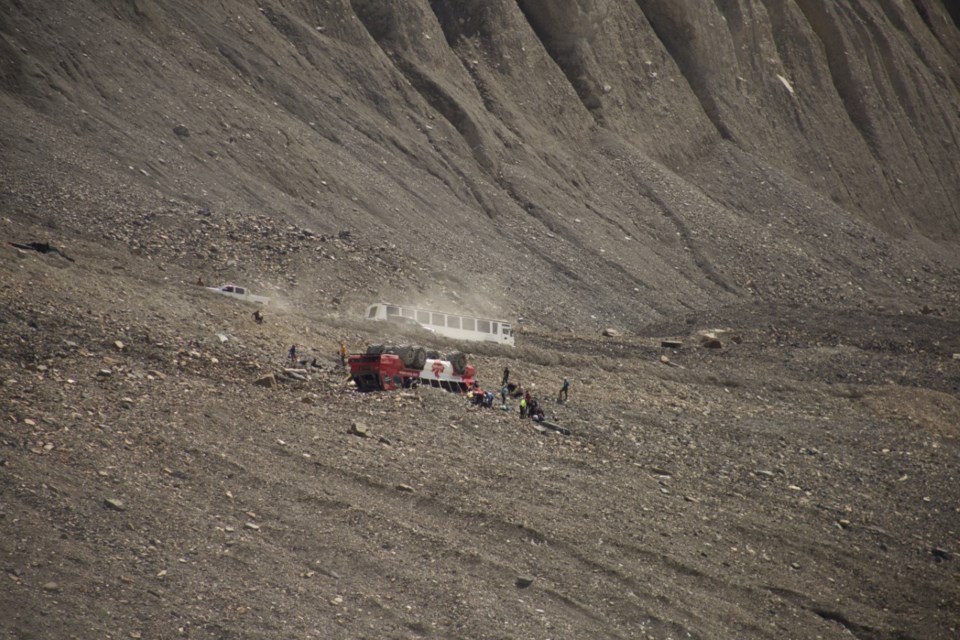 A bus used to transport visitors to the Columbia Icefield is seen overturned Saturday (July 18). RCMP report multiple injuries from the incident, which occurred around 1 p.m. SUBMITTED PHOTO