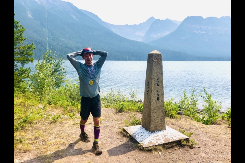 Canmore's Andrew Cotterell at the finish line of the Great Divide Trail in Waterton National Park. Cotterell set the fastest known time of 20 days and seven hours, smashing the previous record of 23 days and eight hours by 73 hours. MEGAN SMITH PHOTO
