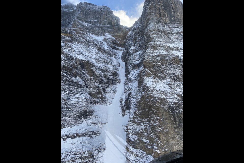 A skier fell down Cobra couloir on Mount Temple near Lake Louise on Monday (Dec. 28). Parks Canada public safety specialists responded, along with Alpine Helicopters Inc., and heli-slung the skier to a nearby ambulance. PARKS CANADA PHOTO