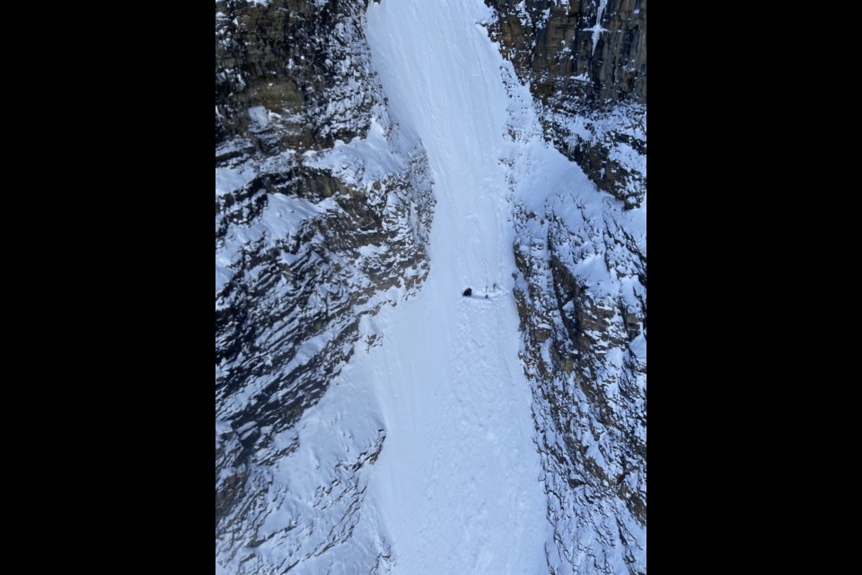 A skier fell down Cobra couloir on Mount Temple near Lake Louise on Monday (Dec. 28). Parks Canada public safety specialists responded, along with Alpine Helicopters Inc., and heli-slung the skier to a nearby ambulance. PARKS CANADA PHOTO