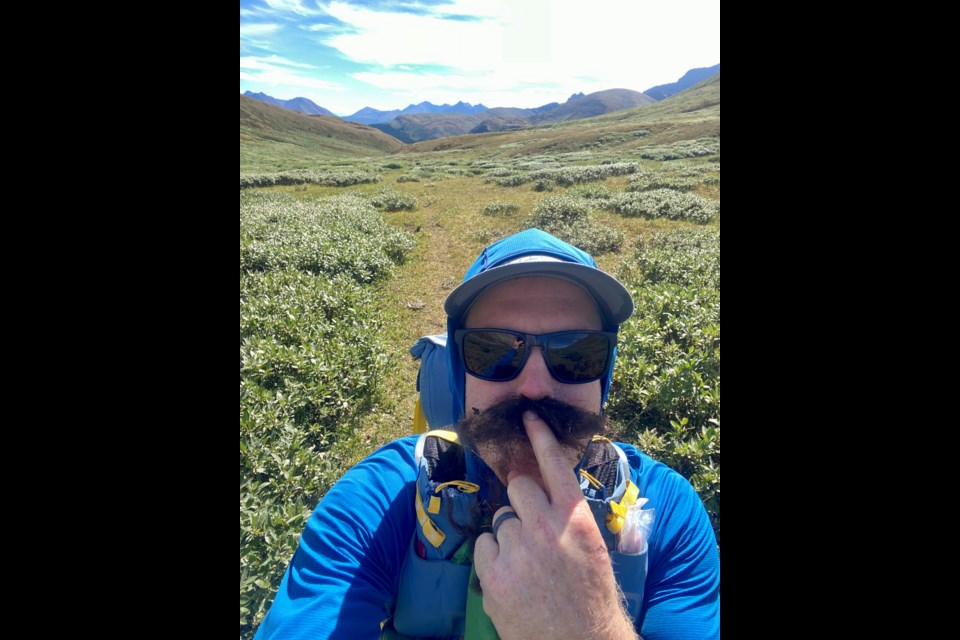 While crossing Divide Pass, Jeff Douglas finds some bison fur and makes a mustache on day one of the project. JEFF DOUGLAS PHOTO