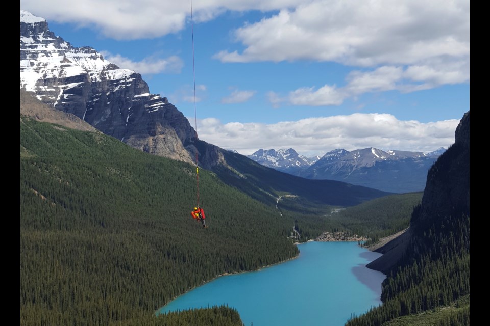 A Parks Canada public safety specialist is flown into 3/4 Couloir near Moraine Lake Saturday (July 18). PAUL CLARKE PHOTO