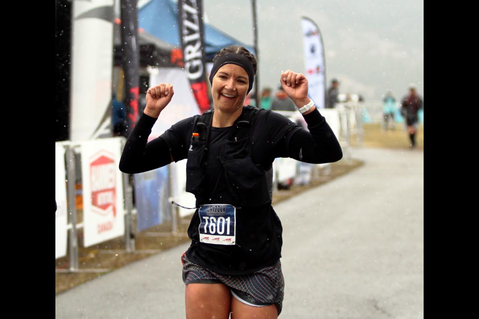 Lindsay Adam crosses the finish line at the Grizzly Ultra Marathon on Sunday (Oct. 10) in Canmore. JORDAN SMALL RMO PHOTO