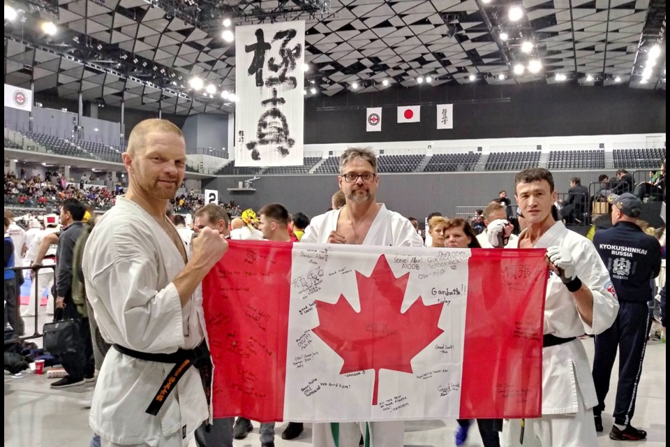 Banff Kyokushin Karate members Sensei Daymon Miller, left, Sempai Francois Pace and Sensei Alexander Kleschelsky from Vancouver at the 12th World Open Kyokushin Karate Championship on Nov. 22 in Tokyo, Japan. SUBMITTED PHOTO