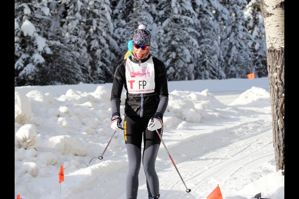 Canmore's Milaine Thériault is the first person to cross the finish line at Sunday's (Jan. 19) 2020 Lake Louise to Banff Loppet & Relay. The three-time Olympian and her son, Xavier McKeever, won the team relay in the cross-country ski race. Their team, 4Kat, was in honour of late a friend and loppet racer. JORDAN SMALL RMO PHOTO