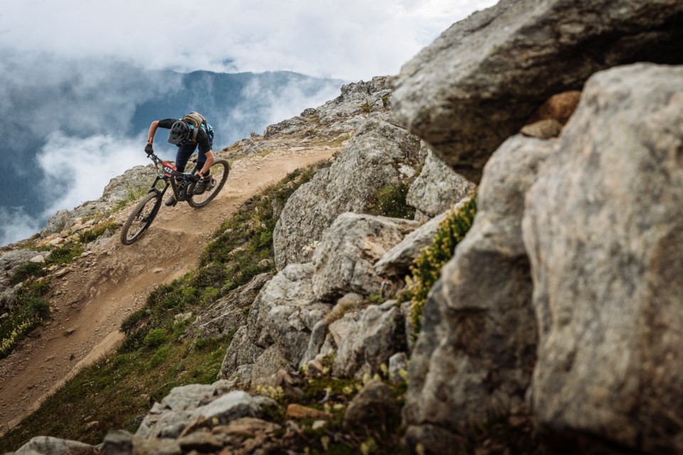 Canmore's Jack Menzies rides down the mountainside during the CamelBak Canadian Open Enduro in Whistler, B.C. in 2019. EWS PHOTO