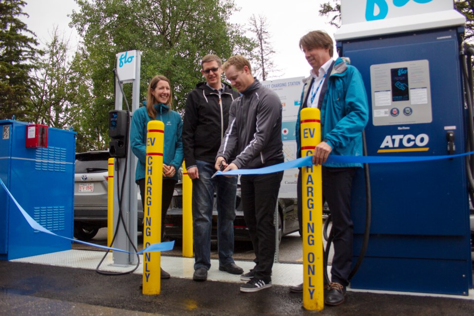 Jeffrey Hilstad cut the ribbon for the launch of the new instalment of Peaks to Prairies EV charging station. Photo Credit: Kiah Lucero