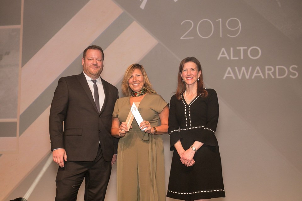 From left to right: Chris Foster, Edmonton Tourism, Judy Glowinski, external relations manager for Parks Canada-Banff and Lake Louise, and the Minister of Economic Development, Tanya Fir, pose for a photo after Parks received its ALTO at the awards ceremony in Banff on Oct. 28. SUBMITTED PHOTO