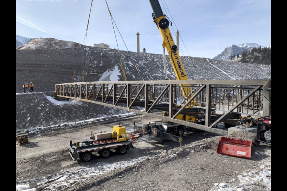 The  Exshaw Creek pedestrian bridge installation on Oct. 30.
GOLDER ASSOCIATES SUBMITTED PHOTO