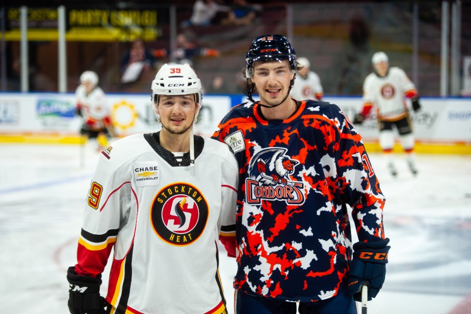 Luke Philp, left, of the Stockton Heat and Noah Philp of the Bakersfield Condors of the AHL. BAKERSFIELD CONDORS PHOTO