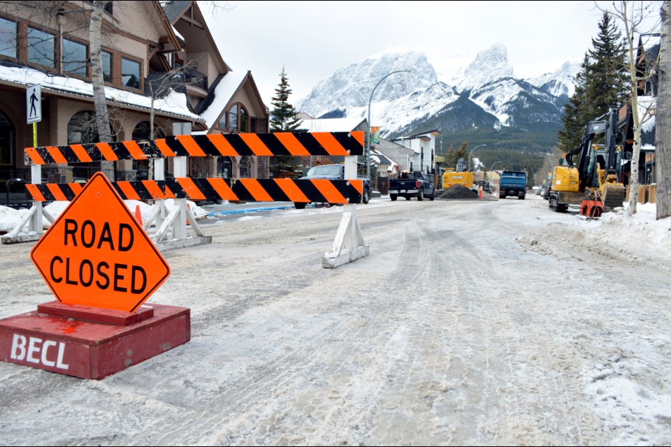 Crews repair a water main break on 10th Street in Canmore on Tuesday (Dec. 27). RMO PHOTO