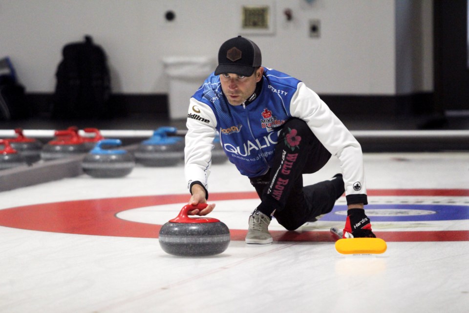 Canmore's John Morris and partner Rachel Homan are crowned back-to-back Qualico Mixed Doubles Classic champs in Banff on Sunday (Oct. 3). Morris and Homan defeated Jocelyn Peterman and Brett Gallant 6-5 in the final. JORDAN SMALL RMO PHOTO