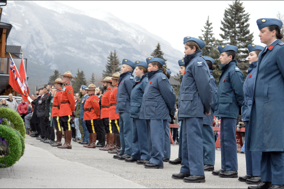 Veterans, serving members of the Canadian Armed Forces, the 878 Banff/Canmore Air Cadet Squadron, and RCMP participate in the 2023 Remembrance Day ceremonies outside the Royal Canadian Legion Three Sisters Branch in Canmore on Saturday (Nov. 11). JORDAN SMALL RMO PHOTO